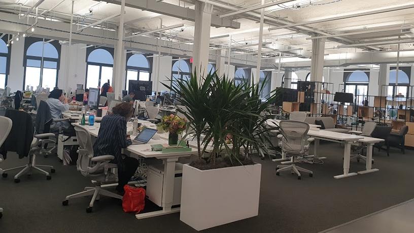 Over 300 Instagram employees work in the New York offices. Their open plan desks are on the east and west side of the floor, leaving common spaces in the middle.