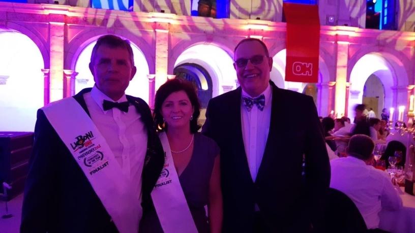 Winners of the OK Foods of the Year store: Christo and Yvette Loots of OK Foods Intermeat with David Geldenhuys from Arch.