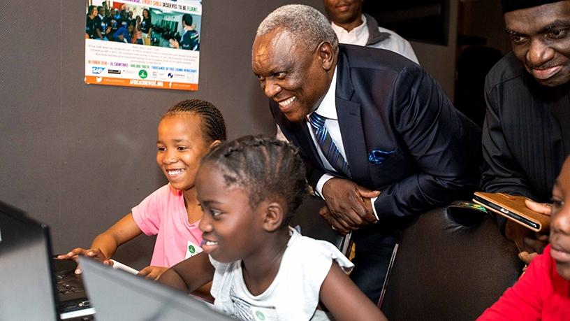 Minister Siyabonga Cwele engages school children at the SAP Africa Code Week launch in Johannesburg.