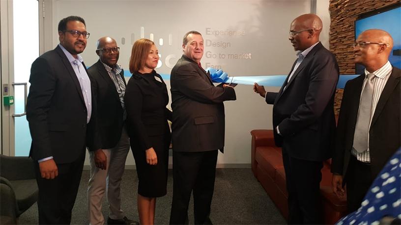 Executives from Cisco, The Innovation Hub and SITA officially unveil the Edge Incubation Centre.