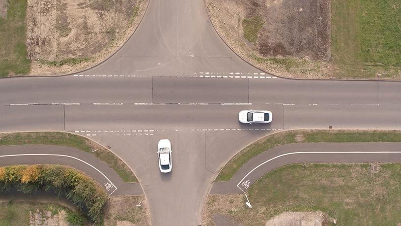 Ford's intersection priority management technology was designed to imitate how pedestrians adjust their speed to avoid others crossing their path.